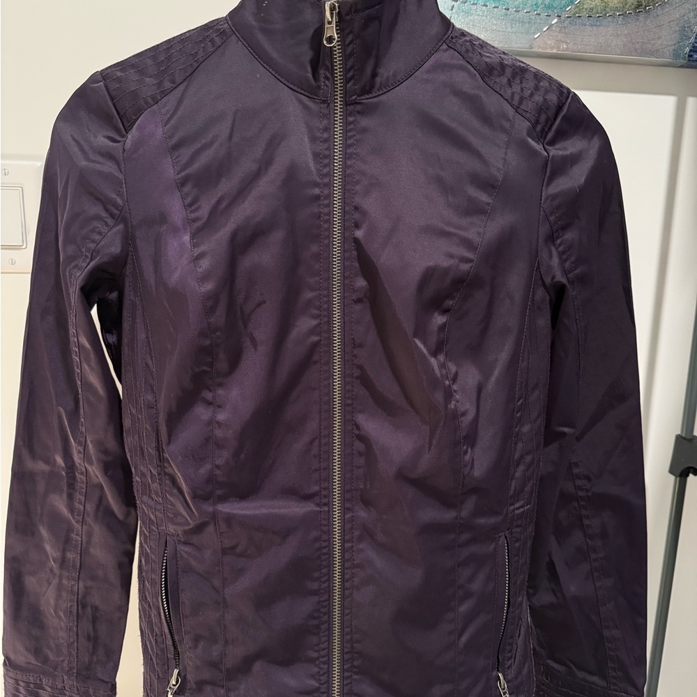Revolution by Ricki’s Purple Jacket